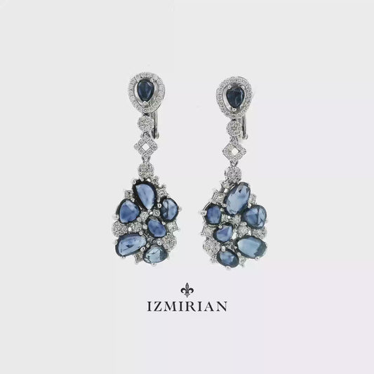 Sapphire cluster drop earrings in white gold shown in motion