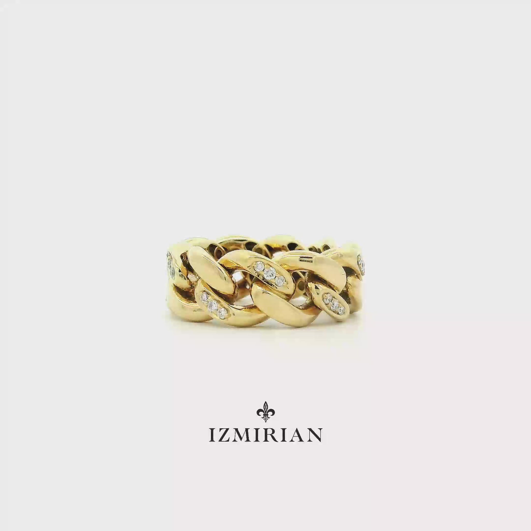 Yellow gold Cuban link ring with diamonds shown in motion
