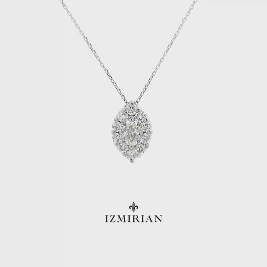 Marquise diamond cluster pendant in white gold shown in motion