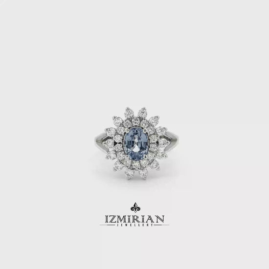 Blue sapphire floral halo ring in white gold shown from multiple angles