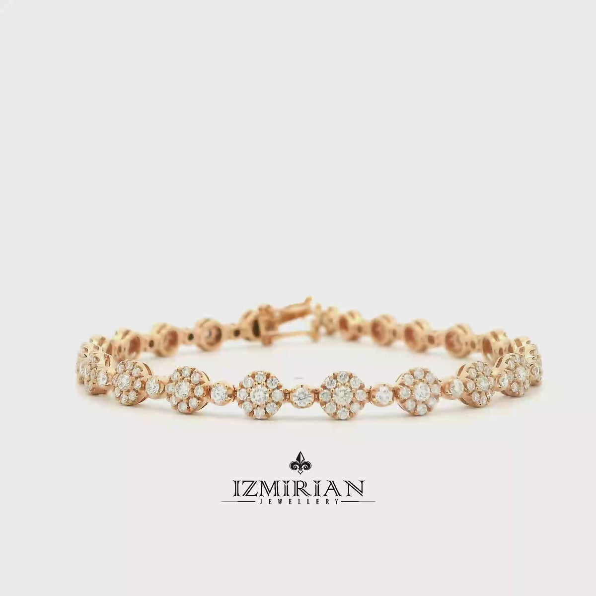 Diamond floral link bracelet in rose gold shown in motion