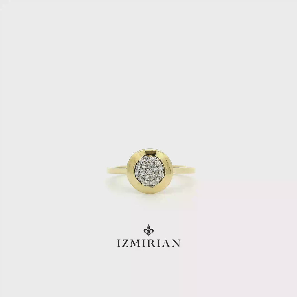 Yellow gold diamond pavé disc ring shown in motion