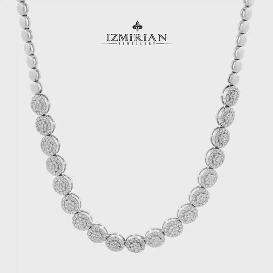 Diamond station necklace in white gold shown in motion