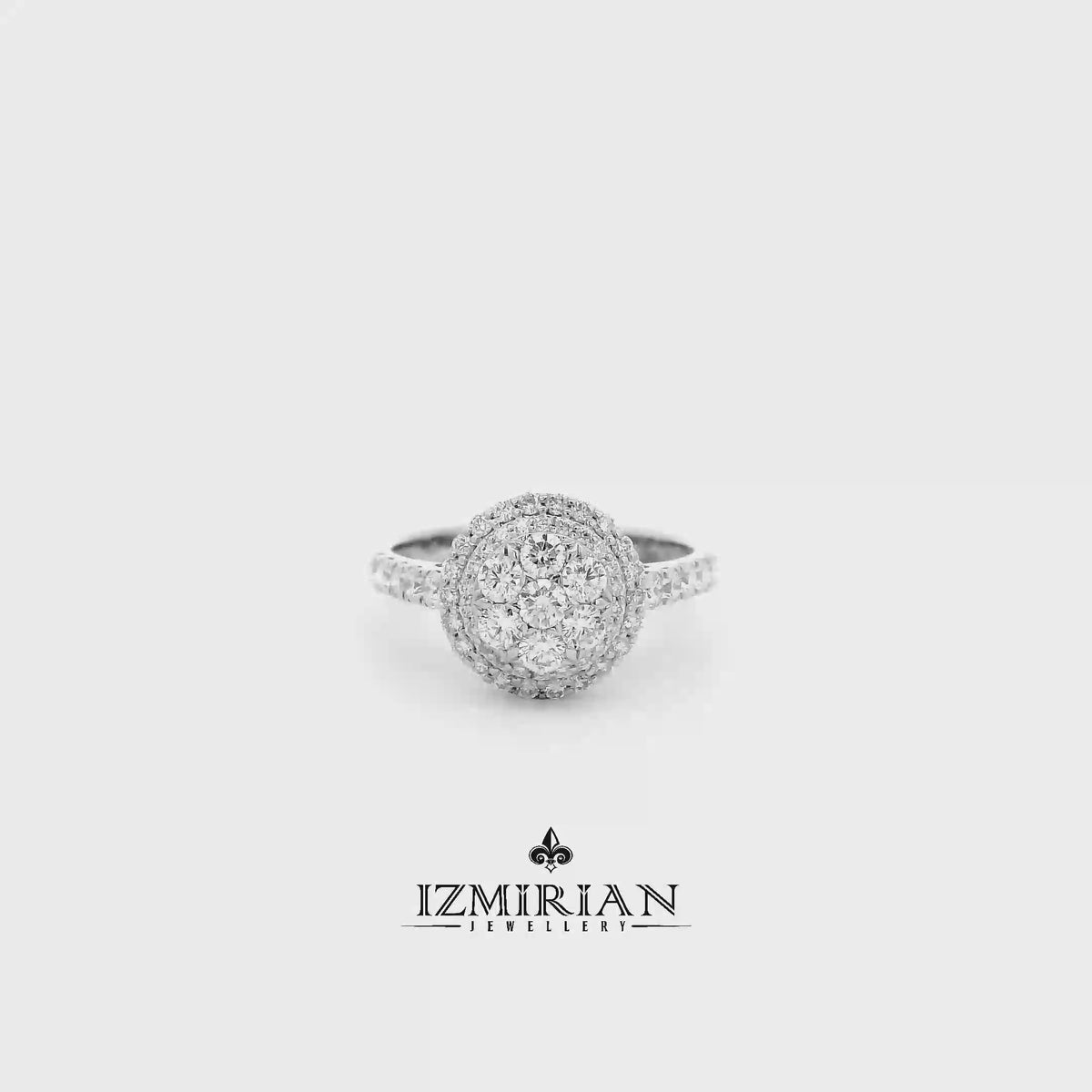 Diamond cluster halo ring in white gold shown in motion