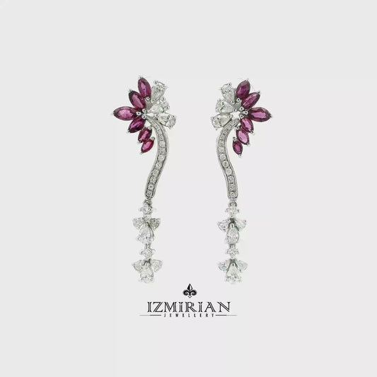 Ruby and diamond vine drop earrings in white gold shown in motion