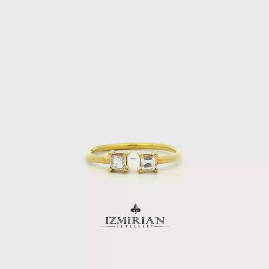 Princess cut diamond Toi et Moi ring in yellow gold shown in motion