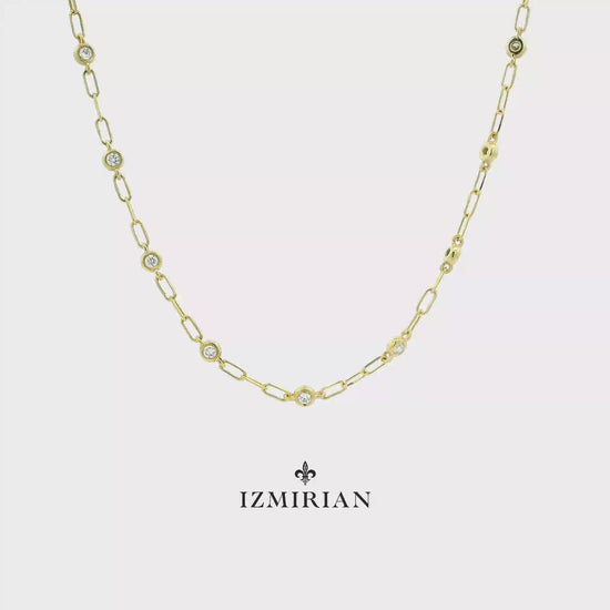 Yellow gold diamond station necklace shown in motion
