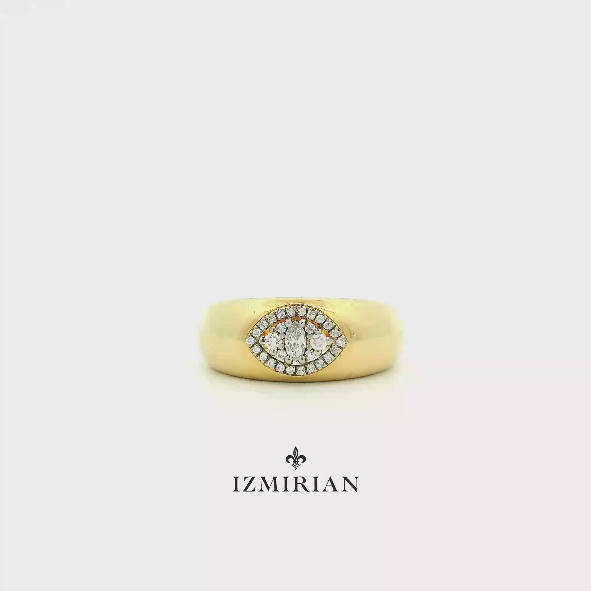 Yellow gold evil eye ring with marquise diamond shown in motion