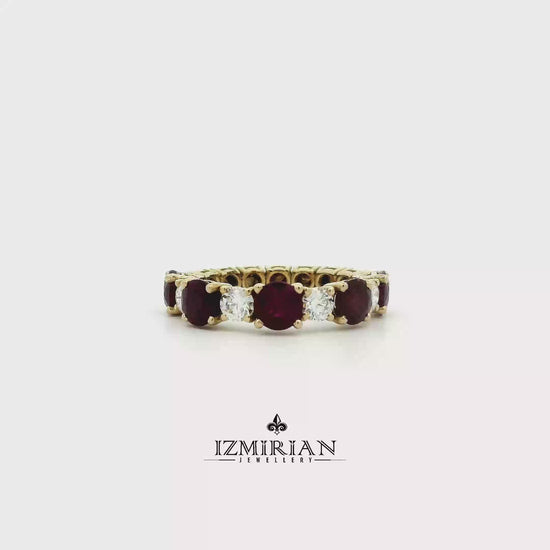 Ruby and diamond eternity band in yellow gold shown in motion