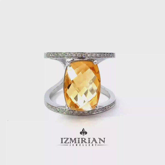 White gold open cuff ring with oval citrine shown in motion