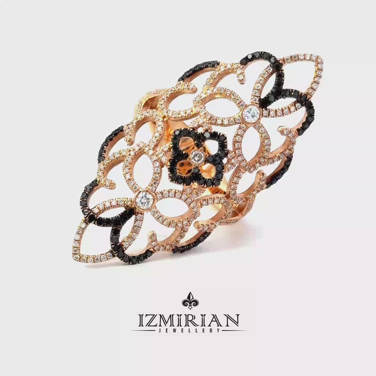 360 video of rose gold floral lattice ring with black and white diamonds