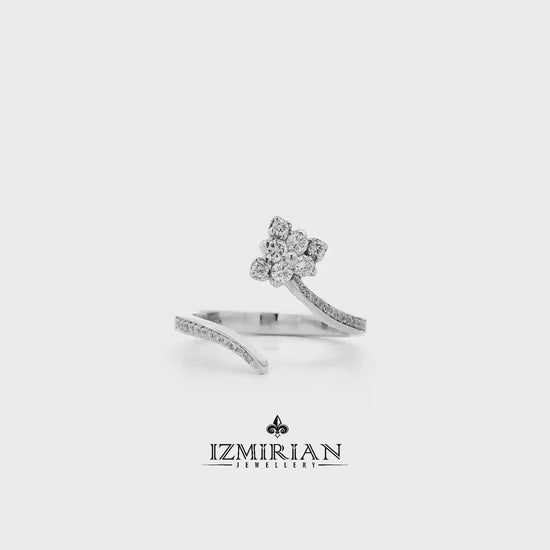 Diamond flower open ring in white gold shown in motion