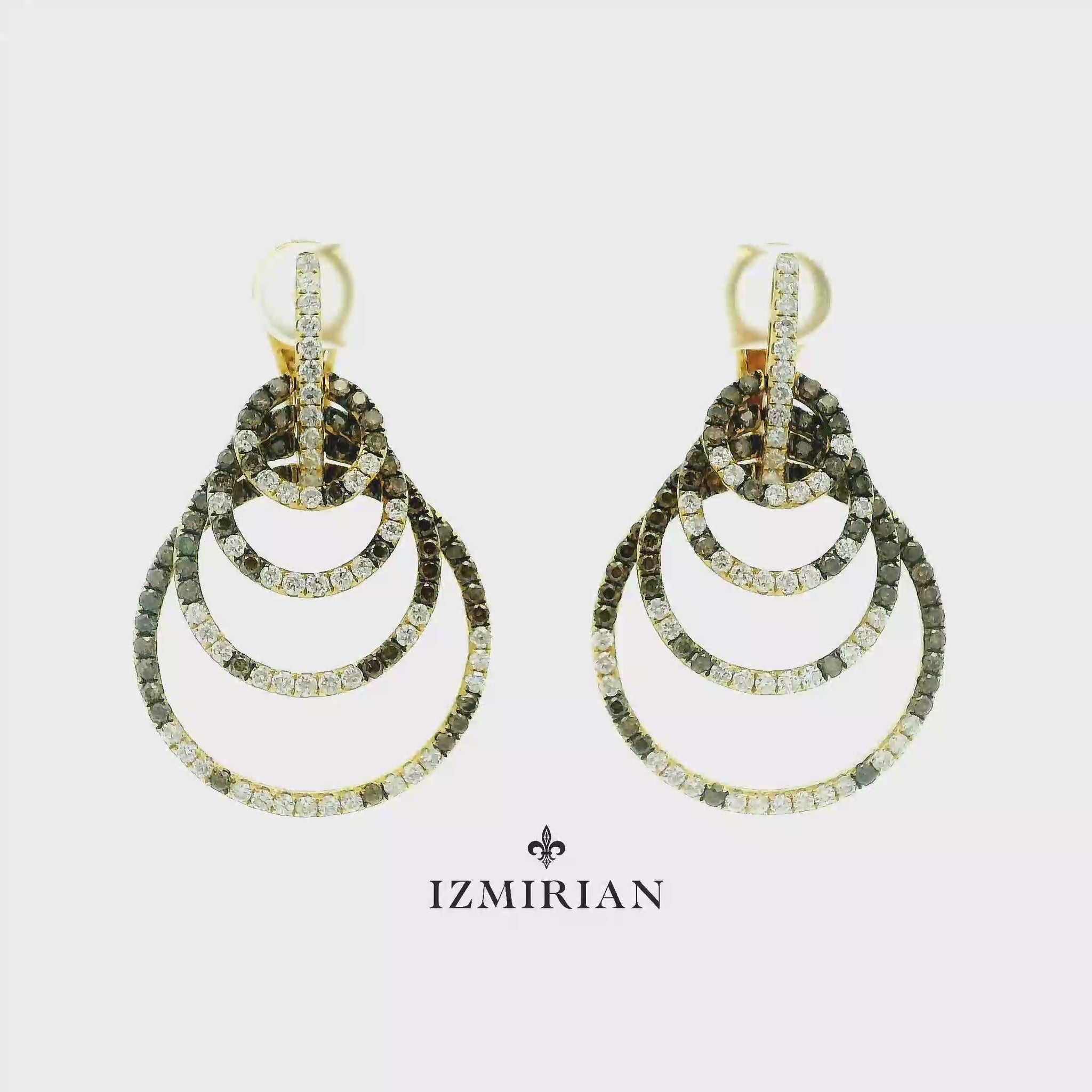 Tiered yellow gold diamond drop earrings shown in motion