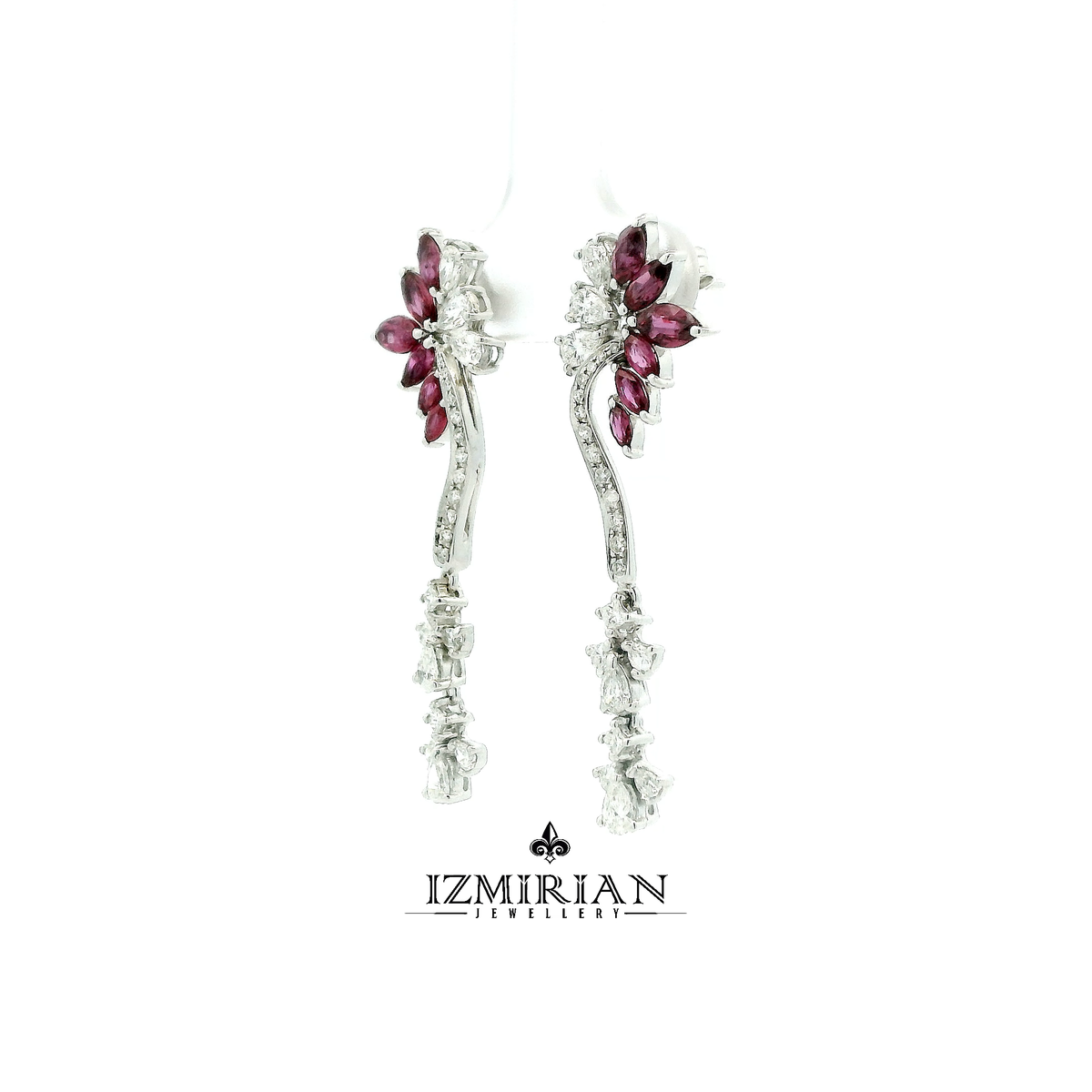Angled view of marquise ruby drop earrings with diamonds in white gold