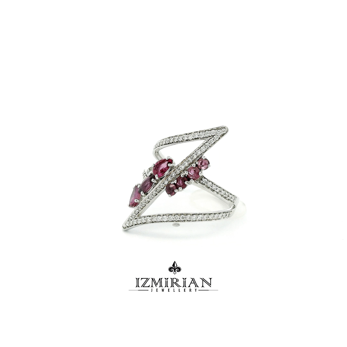 Angled view of diamond and ruby lightning wrap ring in white gold